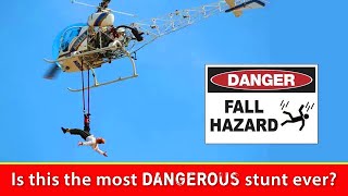 Man Hangs from Helicopter by ONE FOOT!!!  (Daredevil Bello Nock MOST Dangerous Stunt)