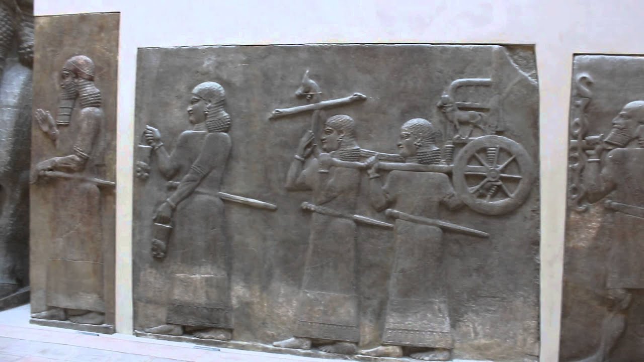Soldiers Carrying a War Chariot - Louvre - Paris June 2014
