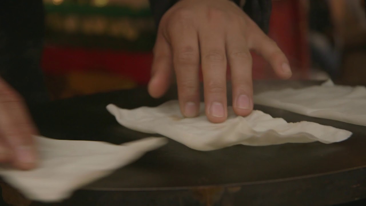 Free HD Stock Footage: Street Vendor Cooking Chinese Food