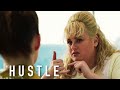 The Hustle | Penny Calls Interpol | Film Clip | Own it now on Blu-ray, DVD & Digital