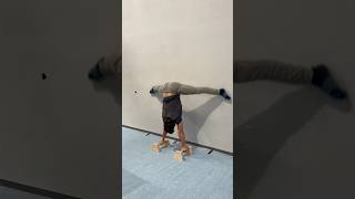 Against the Wall Straddle Press Feet Circles