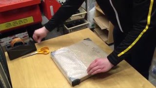 Vinyl record expert packing.