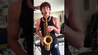 Sean Cameron plays National Anthem on the sax
