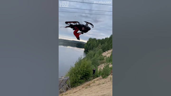 Guy leaps out of lake in a jet-ski #jetski #stunt #shorts