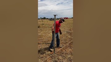 Driving T-posts with a tractor