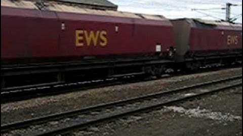 Class 66 coming hoppers  fully loaded with coal