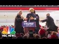 Secret Service Agents Rush Stage to Protect Donald Trump At Rally | NBC News