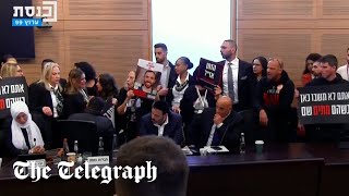 video: Israeli hostage relatives burst into parliament