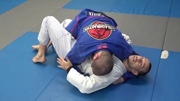 Getting to closed guard from half guard (Lachlan Giles)
