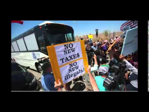 Protesters on Tuesday blocked three busloads of immigrant families