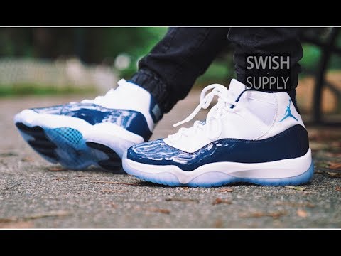 white and navy blue jordan 11