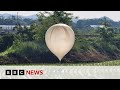 North korea drops trash balloons on south korea  bbc news