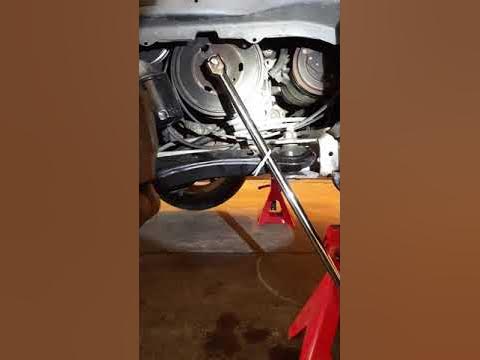 breaking loose harmonic balancer bolt by turning over engine! - YouTube
