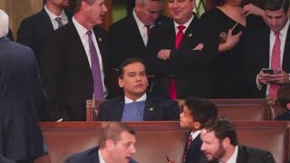 Rep.-elect Santos quiet as speaker vote delays swearing-in