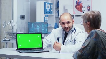 Green screen laptop in doctor office 4K  with tracking markers