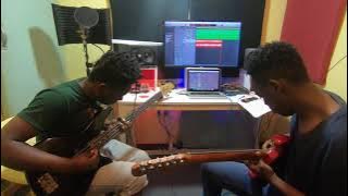 MFALME WA AMANI - SOLOMON MKUBWA (GUITAR COVER ) BY VICKY AND MSOLO