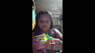 Completing the first layer of the Rubik's cube.
