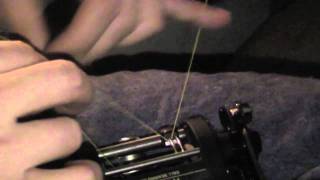 Spooling a conventional level wind reel