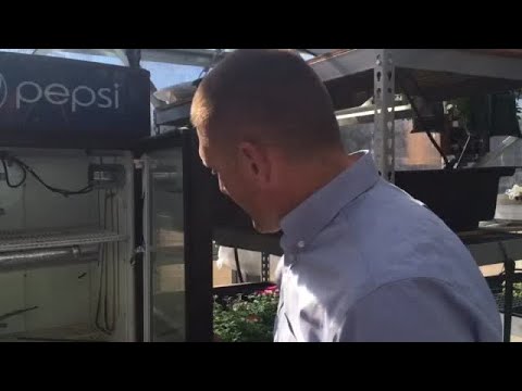 Teacher at Will James middle school tours the school’s greenhouse