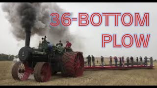 150 CASE steam engine plowing with 36 bottom John Deere plow