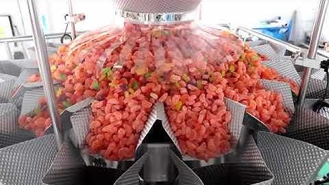 Automatic gummy candy bottling line.  How to weighing gummies in bottles automatically?