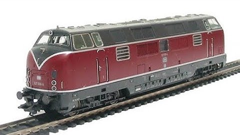 Trix 22757: DB BR 221 108-4 Diesel Locomotive pulling Lima/Rivarossi "Italien Holland Express"