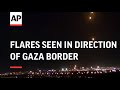 Flares and blasts seen in direction of Gaza border overnight from Ashkelon, southern Israel