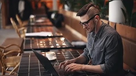 Programmer Typing On Laptop Stock Video