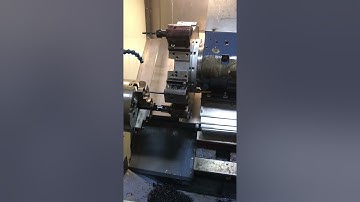 Tiện CNC kéo phôi tự động