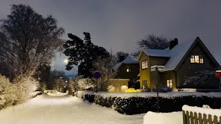 Snowy suburb streets. Walking among the houses to Spånga Center. 