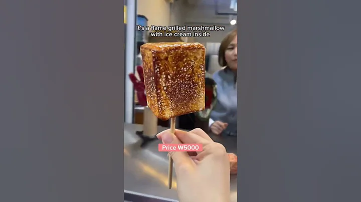 Trying flame grilled marshmallow in Seoul 🔥🦖 #streetfood #seoul #korea #food #hongdae #travel