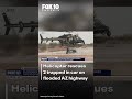 Chopper rescue saves 2 on flooded Arizona highway | FOX 10 Phoenix
