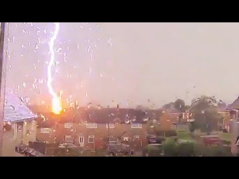 Moment lightning strikes house in Wales | UK weather
