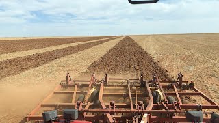 Versatile 2425 pulling a Krause 4815R