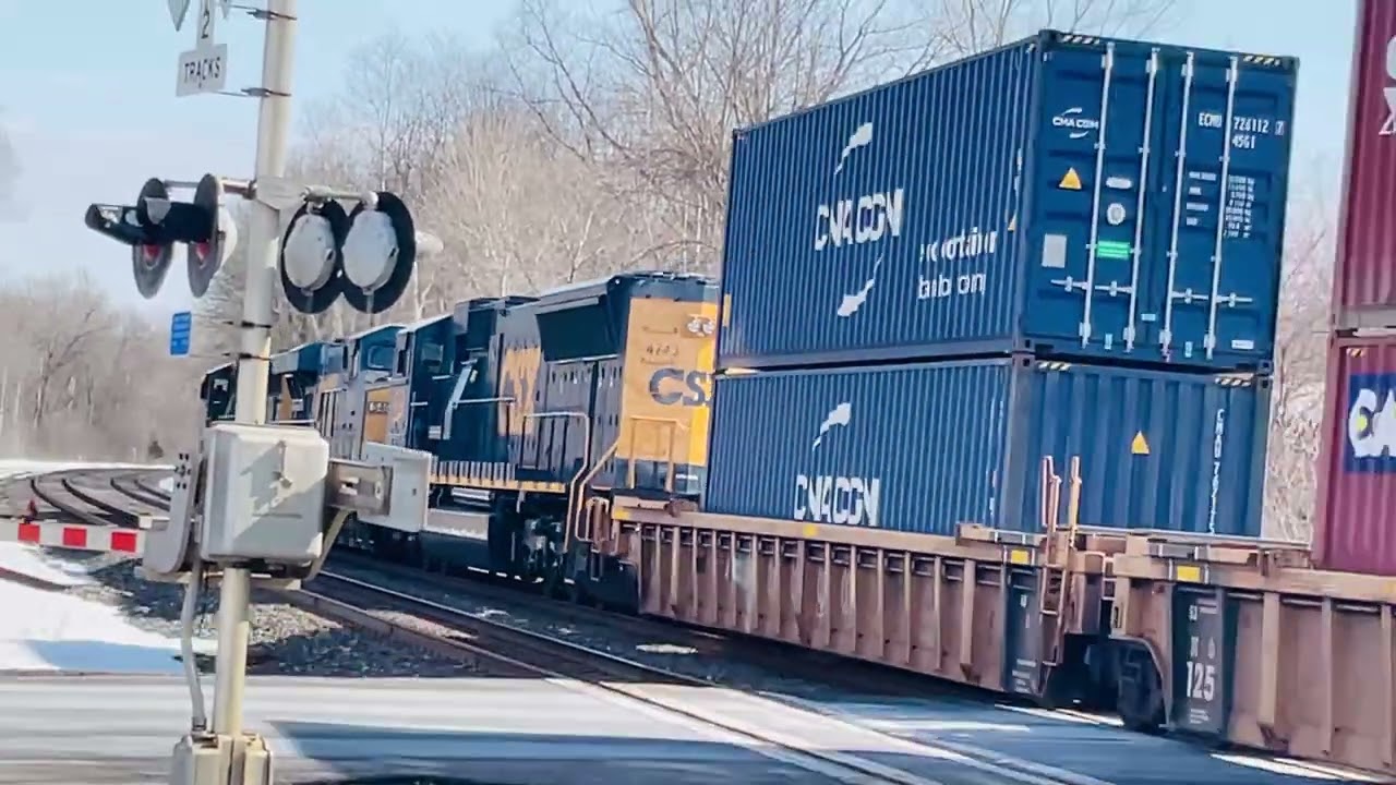 CSX sd70MAC 4532 leads a long eastbound stacker across pottery with a horn show