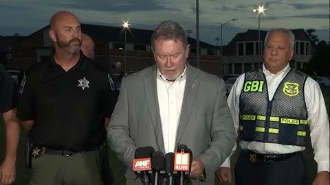 Georgia arrests, charges father of school shooting suspect | REUTERS