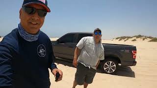 Catching sand at South Padre Island TX an East Cut 'Jetties' Adventure