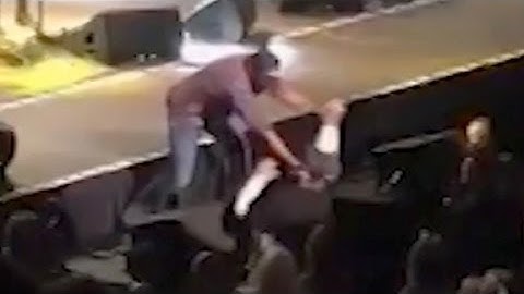 Country star smacks fan during show