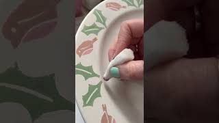 Finishing touches to the Christmas plate π #ceramic #christmas #handpaint #spongeware #pottery