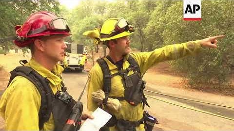 Firefighters Work Feverishly To Contain Blaze