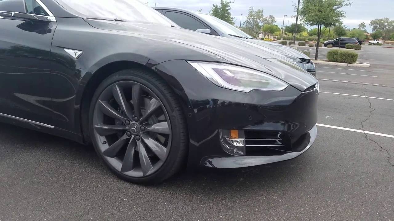 New 2016 Tesla With Auto Drive And 2015 Toyota Corolla S Lowered Customized Black Rims