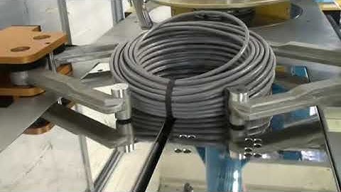 Automatic cable winding and strapping Machine