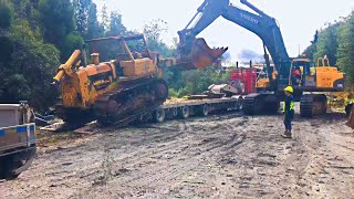 70 Ton Excavator pulling the Abandoned 40 Ton Terex Bulldozer on a transporter