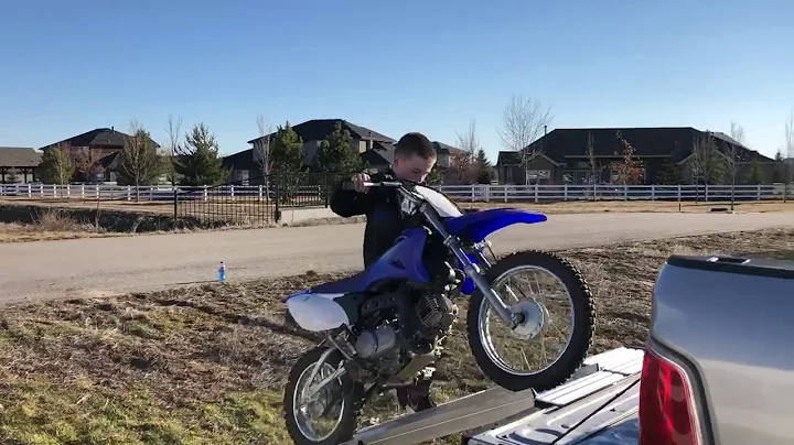 10 Year-Old Loads Motorcycle By Himself With Step Ramp