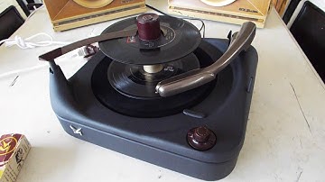 V-M automatic record changer playing a stack of 45