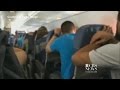 Watch: Passengers brace for emergency plane landing