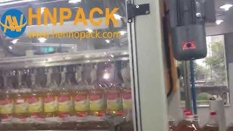 hennopack food oil bottle case packer with abb robot palletizer packing line