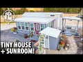 Huge tiny home w sunroom is her affordable retirement plan