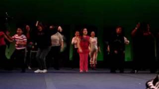 lady spectator dance at cheer competiton