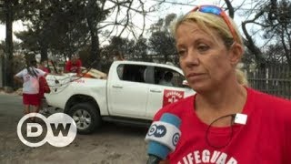Greece: Tragic fires leave coastal town to gather its dead | DW English